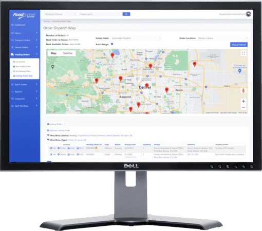 A Dell monitor displaying custom cloud-based software with a geographic map