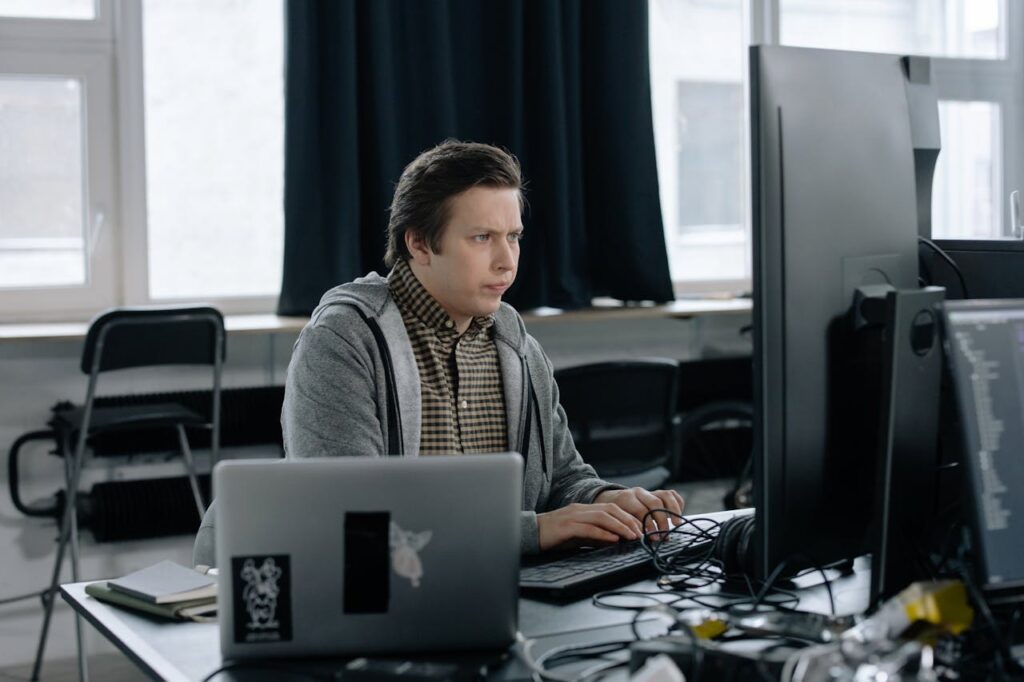 Gold key resting on a computer keyboard symbolizing a key to business success